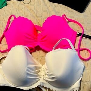Two Victoria’s Secret swimsuit tops